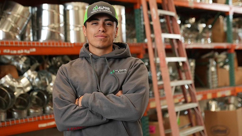 Alpine technician in warehouse.