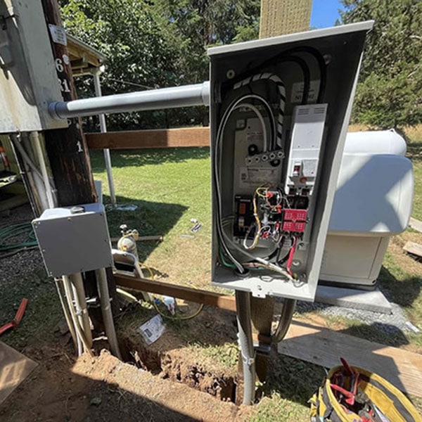 Circuit breaker being installed outside a home.