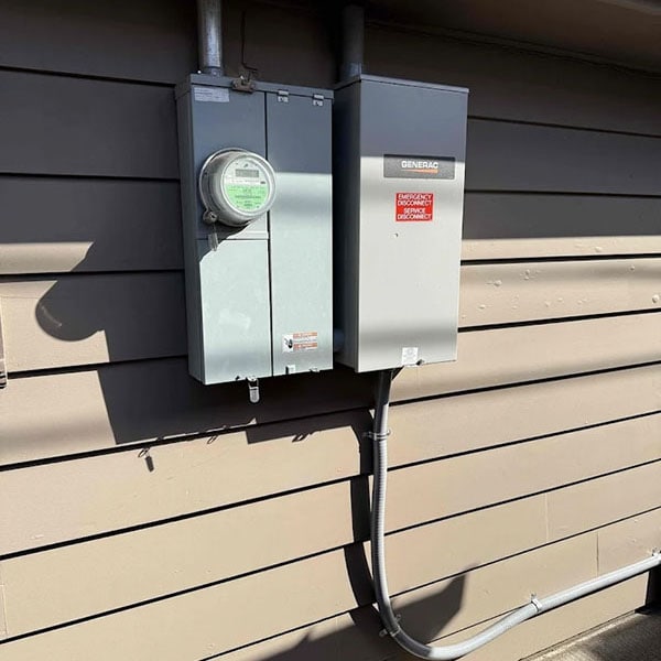Circuit breaker on the wall outside a home.