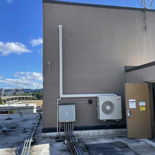 A recently installed commercial hvac system on a rooftop.