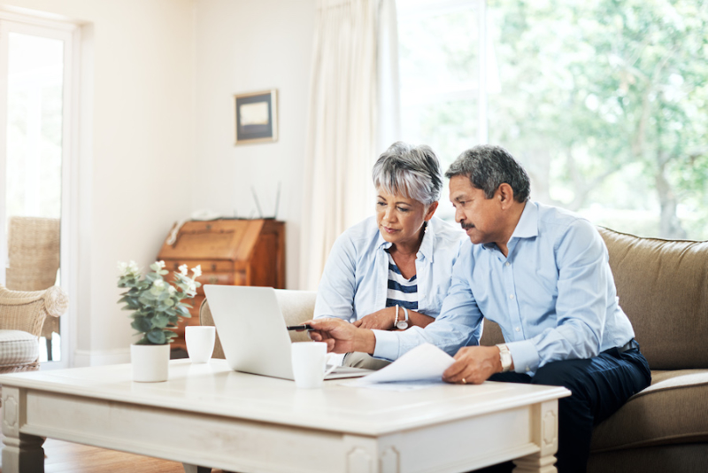 Shot of a senior couple using a laptop together at home.