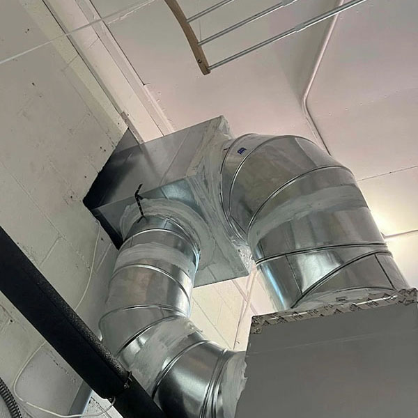 HVAC duct work using sheet metal in a home.