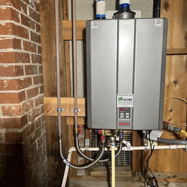 A gas fireplace being installed in a home.