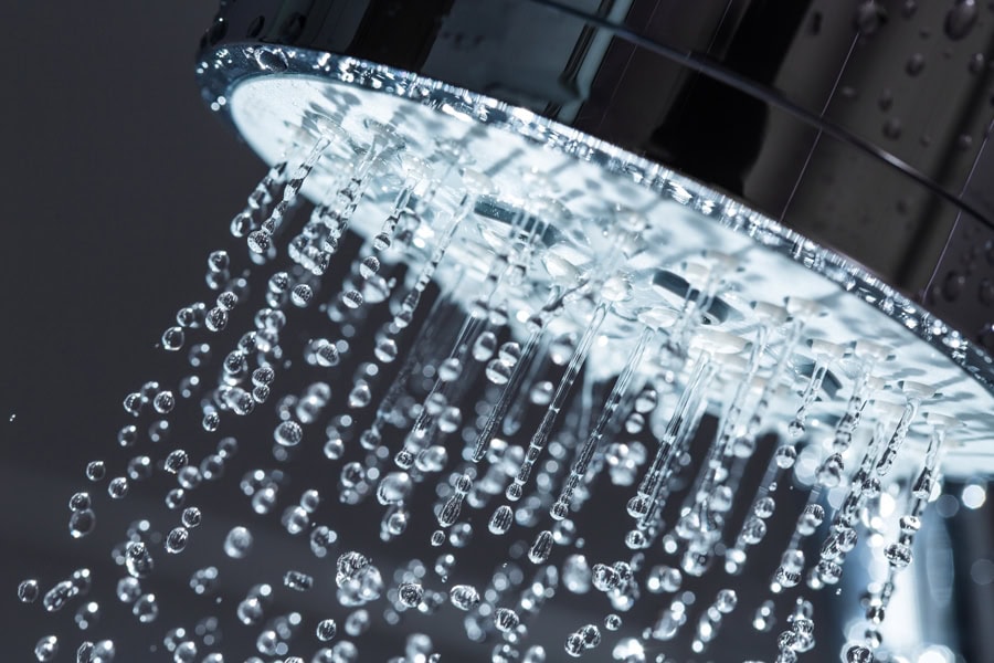 Shower head with hot water.