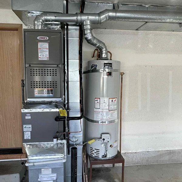 Water heater installed in the basement of a home.